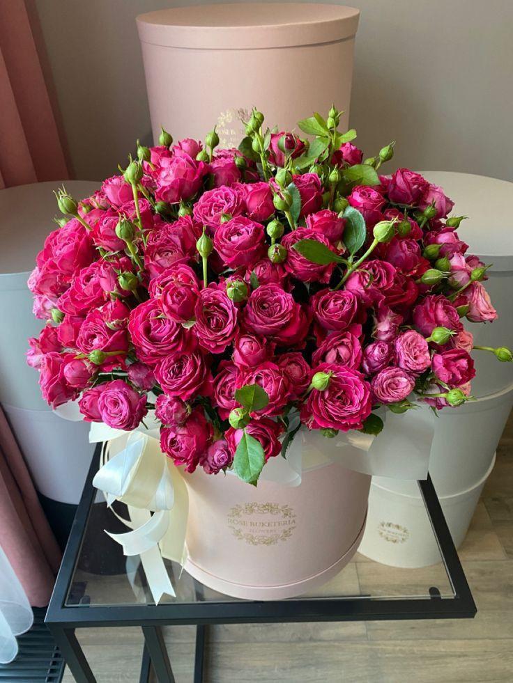 Corporate meeting room with carefully timed floral arrangements that maintain elegance throughout business hours